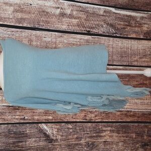 Light teal or sea blueish poncho with fringe & fur